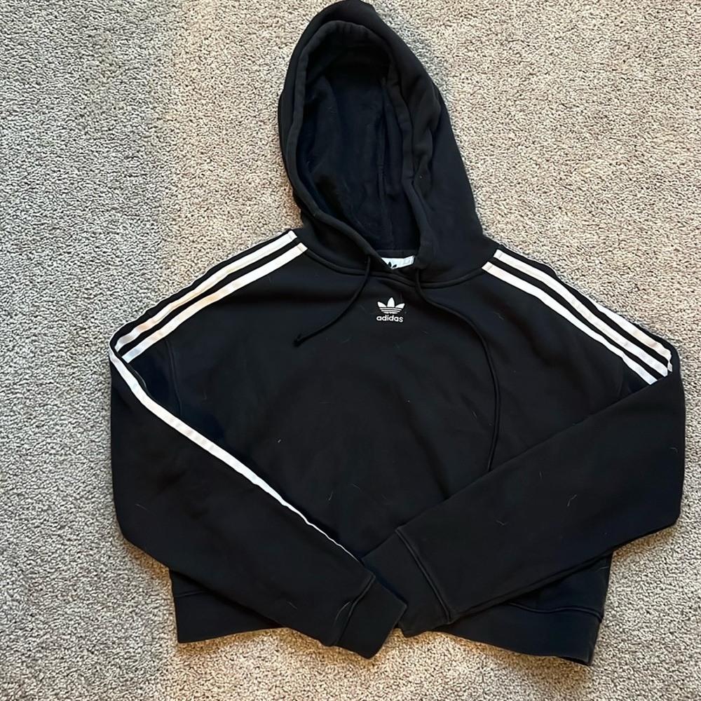Women’s adidas black cropped hoodie.